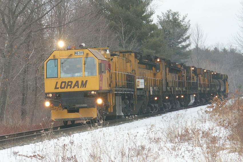 Photo of RG311 rail grinding train.