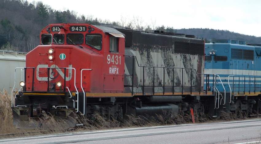 Photo of RMPX 9431 in service on the NECR near Montpelier VT.