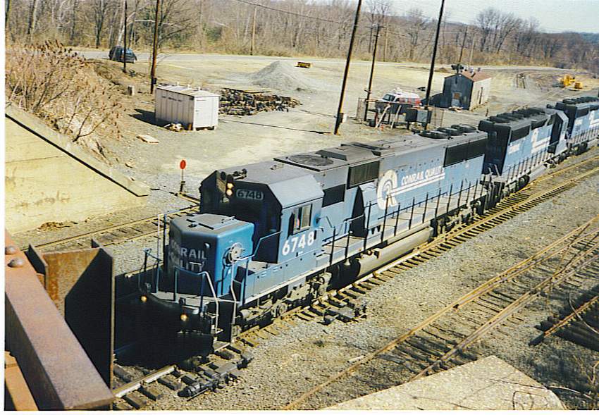 Photo of Conrail 6748 leading empty coal train in East Deerfield, MA