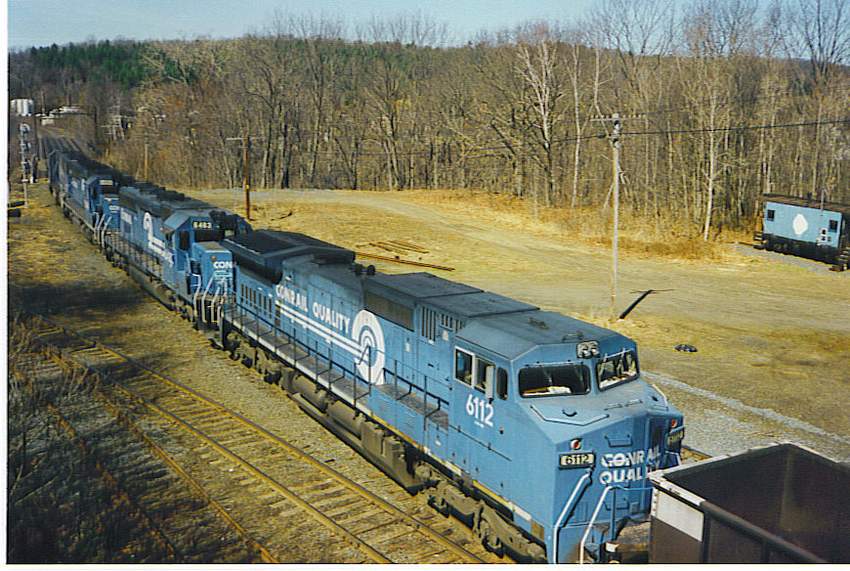 Photo of Conrail 6112 part of empty coal train in East Deerfield, MA.
