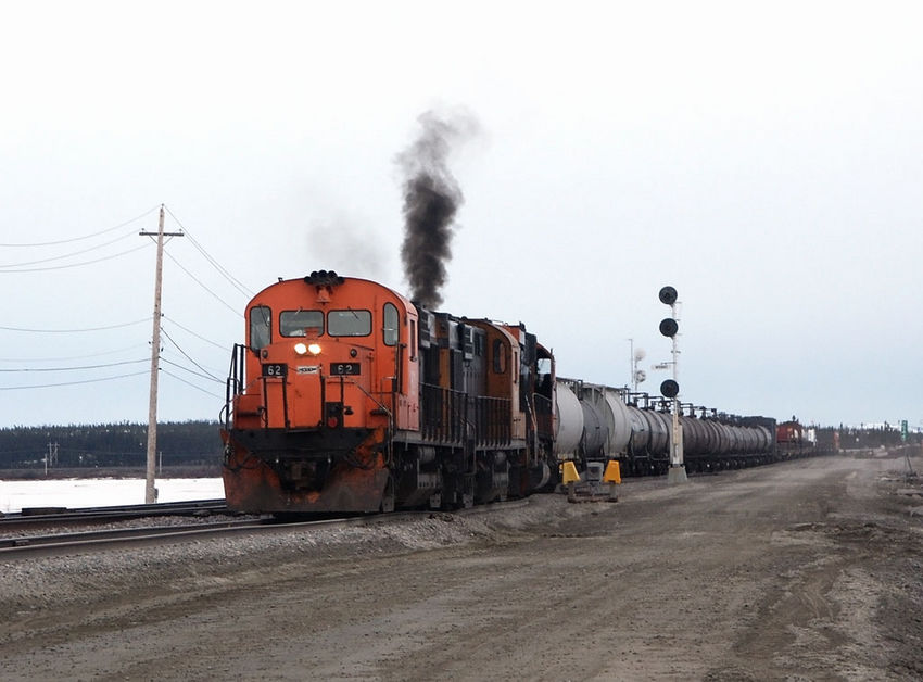 Photo of RS18 number 62 leads this mixed freight into Mont Wright Quebec