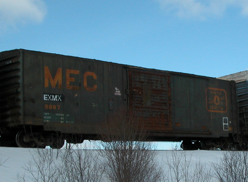 Photo of EX MEC Boxcar converted to a chip car by QC