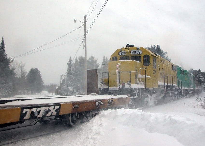 Photo of NBS 904 leaving Brownville Junction in a snow storm