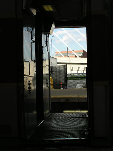 Photo of The blue sky reflects in a cab controll car in North Station