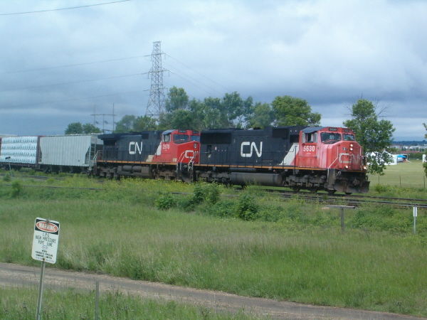 Photo of CN 5630 and CN 2570 heading east through Clover Bar, AB