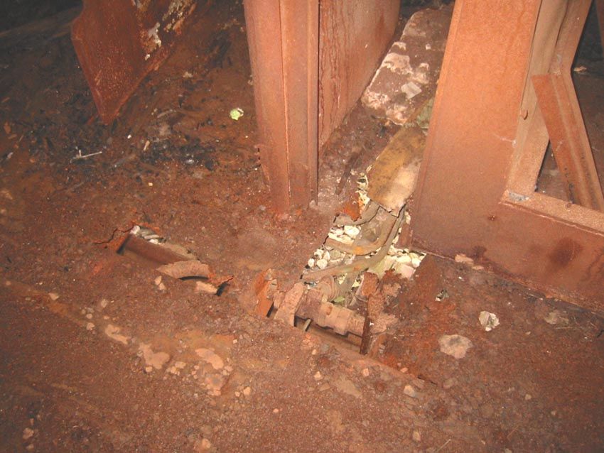 Photo of Rusted out floor.