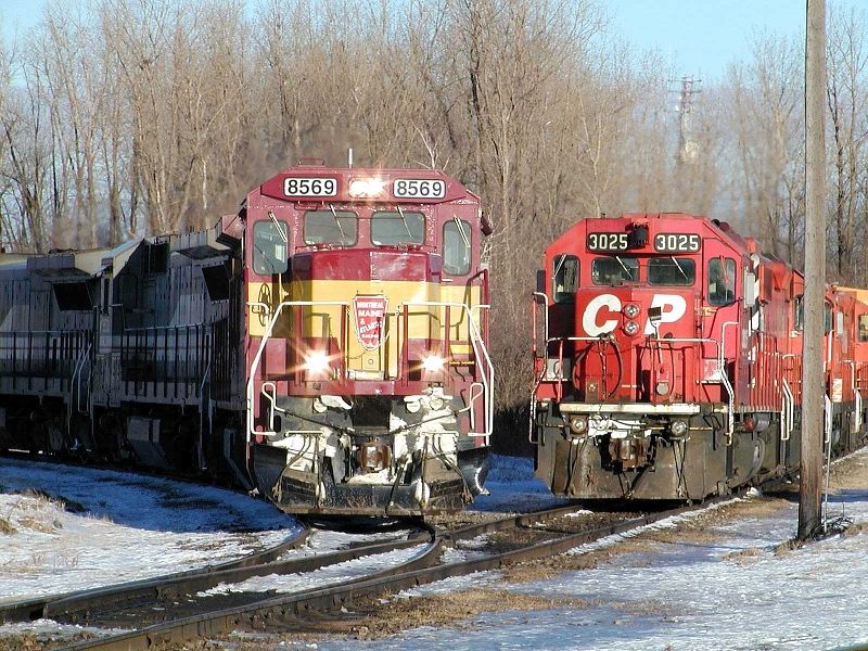 Photo of MMA B39-8E 8569 traverses the CN interchange track at Delson,Quebec