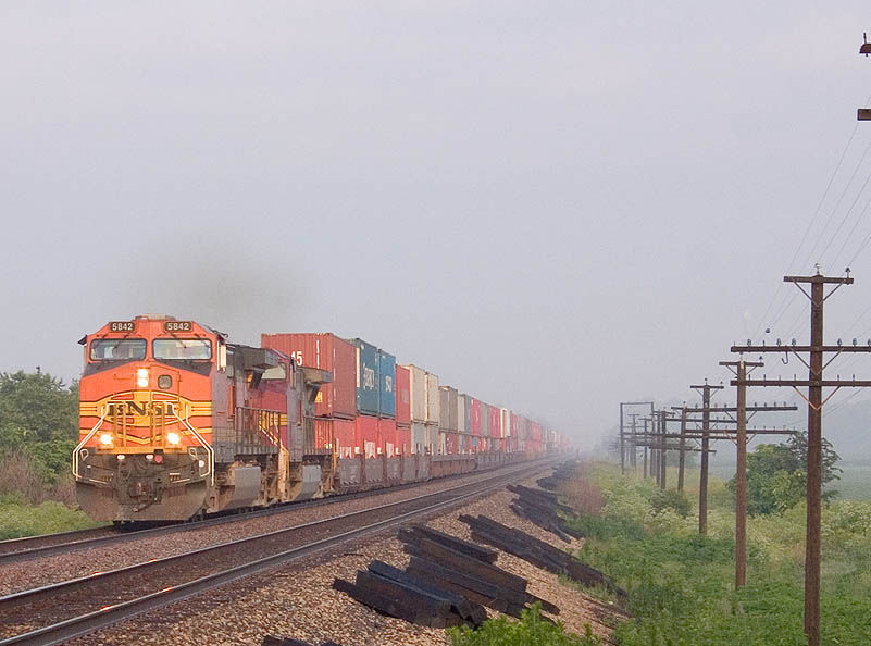 Photo of BNSF 5842 comes out of the mist near Toluca, IL.