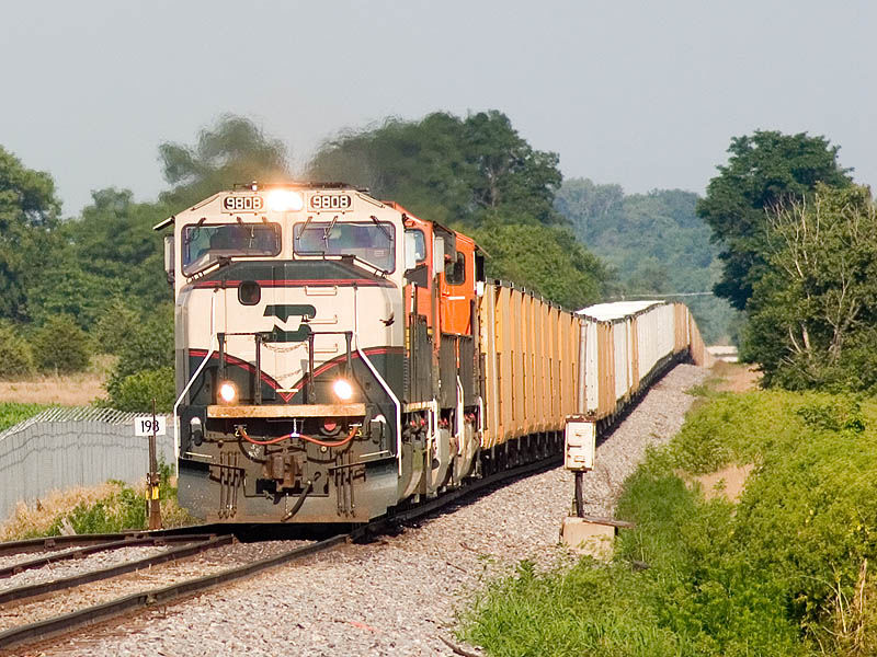 Photo of BNSF 9808 leads an eastbound coal train into Ft. Madison, Iowa.