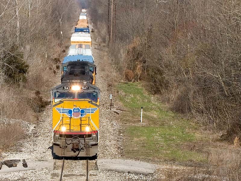 Photo of CSX train Q511-21 has UP 5147 at the point. Scottsburg, IN.