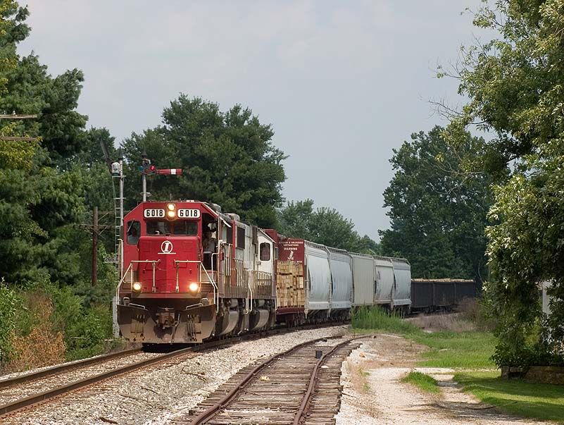 Photo of INRD 6018 leads the HWLVT (CSX Z490) north through Leipsic, IN.