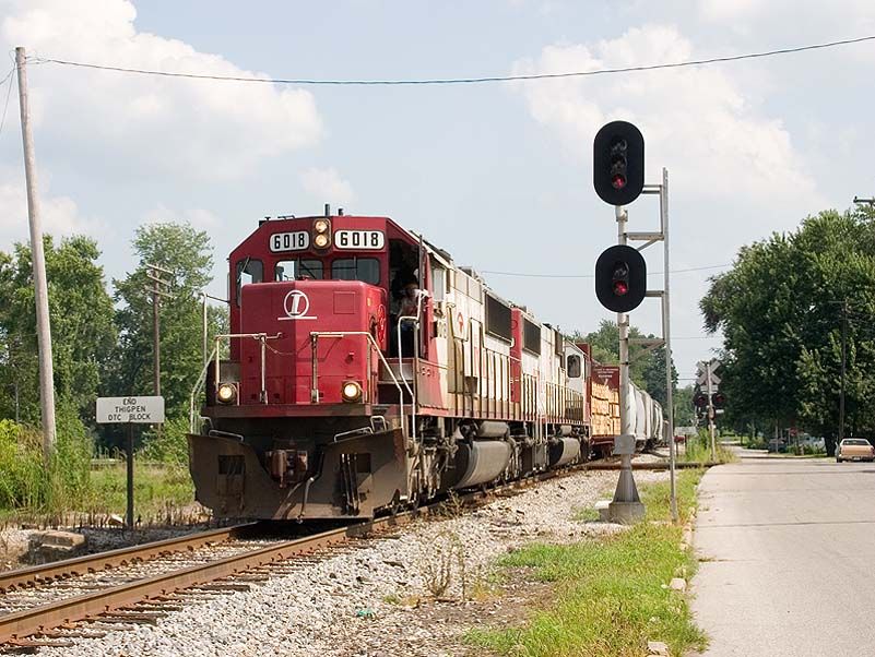 Photo of INRD 6018 leads the HWLVT (CSX Z490) north through Mitchell, IN.