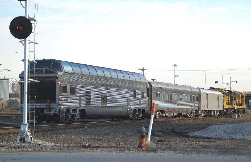 Photo of BNSF executive train going away.