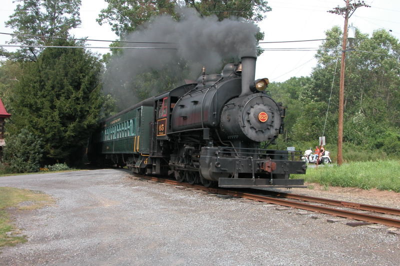 Photo of WK&S #65 at a grade crossing north of Kempton