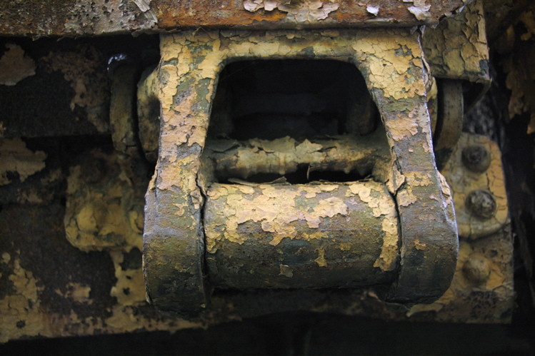 Photo of A closeup of a massive hinge on an old MTA side-dump car