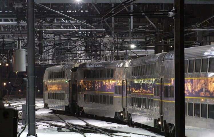 Photo of A string of bi-levels departs South Station, Boston