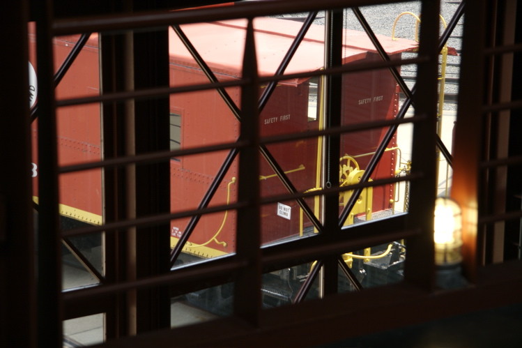 Photo of A coopola-style red caboose @ Steamtown