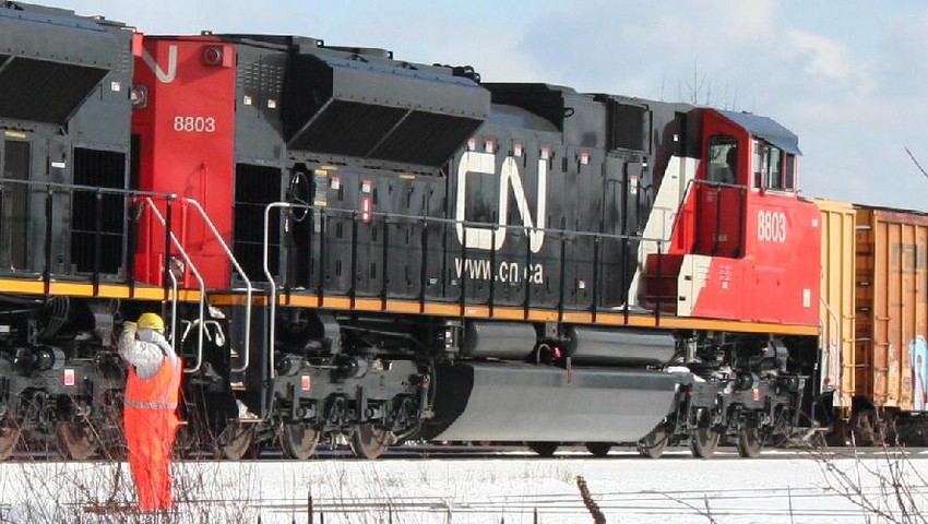 Photo of CN 8803 gets a roll by inspection