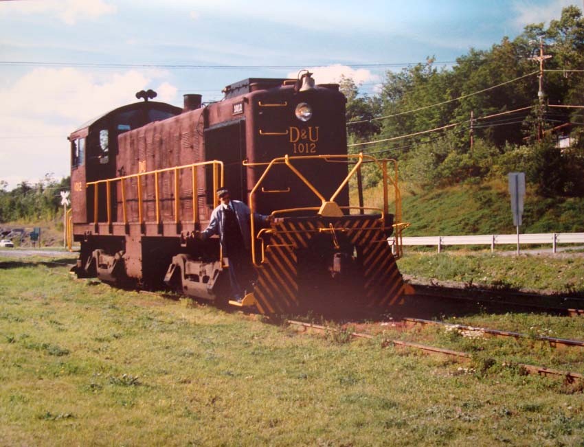 Photo of Delaware & Ulster locomotive at Highmount, NY on the CMRR line 1985