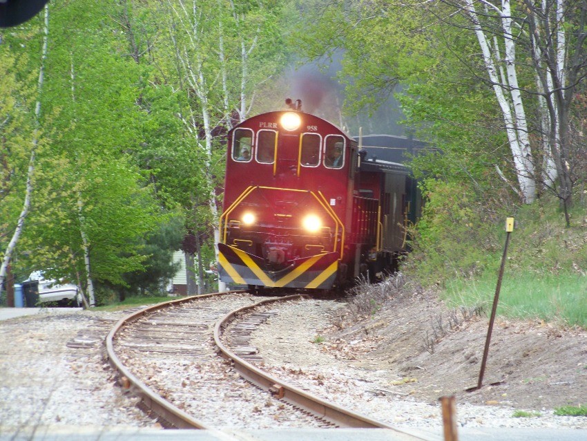 Photo of Caboose Train Coming'round the Bend