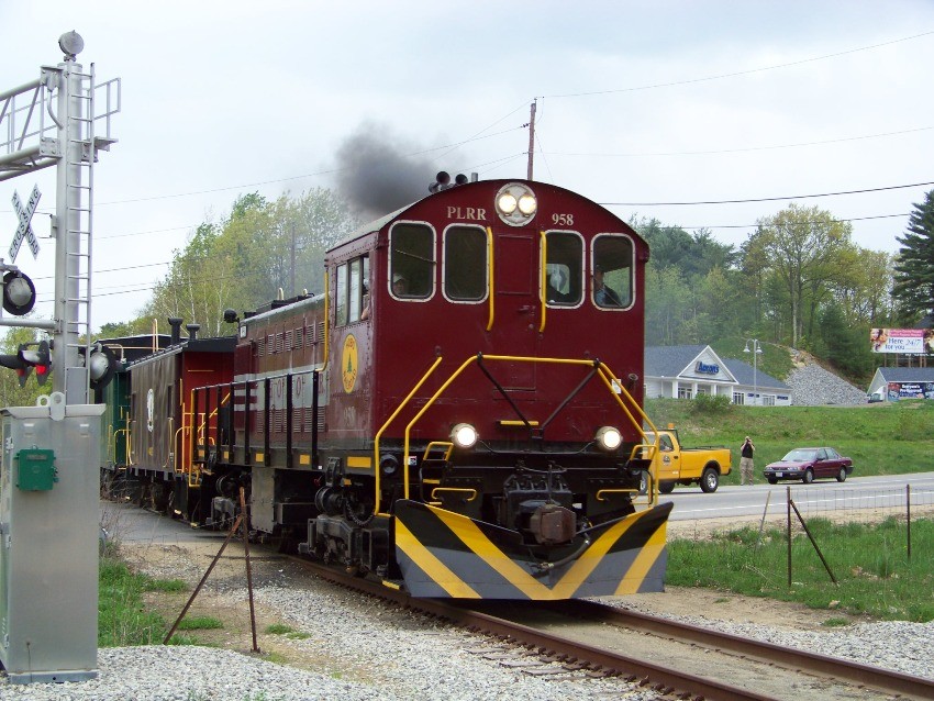 Photo of Caboose Train On teh Crossing