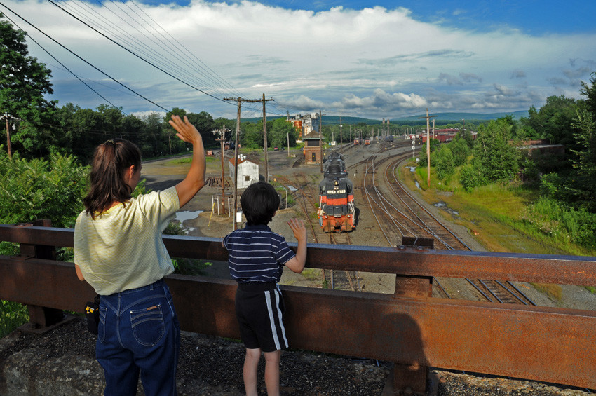 Photo of Young railfan salutes old guilford power