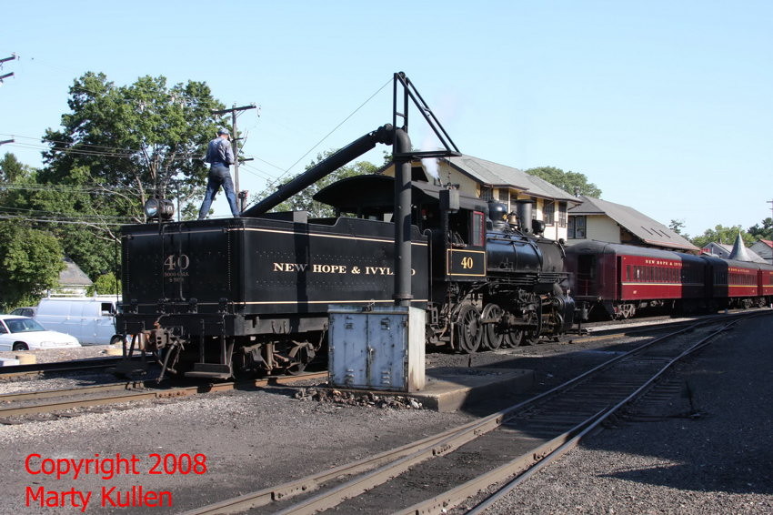 Photo of New Hope & Ivyland Baldwin 2-8-0 #40 takes a drink.