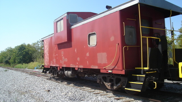 Photo of Ex Morristown & Erie EV caboose at Rockland yard