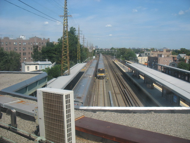 Photo of Train Action at Woodside NY IRT Flushing Line & the LIRR