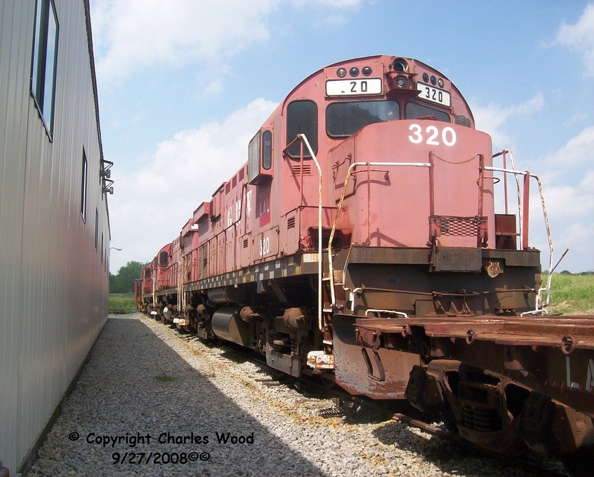 Photo of Three of LA&Ls ex-GBW parts C424s sit outside the Lakeville ny engine house.