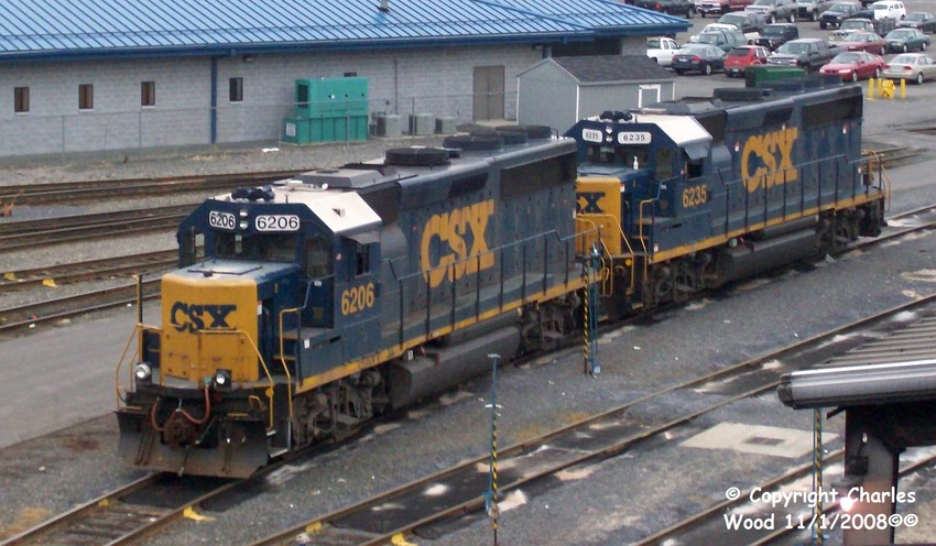 Photo of Two GP40-2s in YN3 sit unassigned at the CSX Selkirk Shops CSXT 6206.