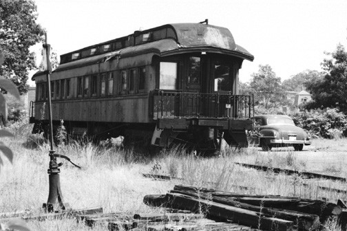 Photo of NPRR, Pullman  car sits in Peace Dale Yard, 1977