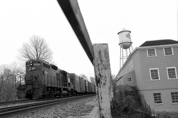 Photo of Conrail freight passing Kenyon Mill, April 1978