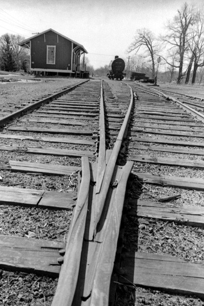 Photo of 1 of 4, Peace Dale Yard of NPRR lQQkn east,1974
