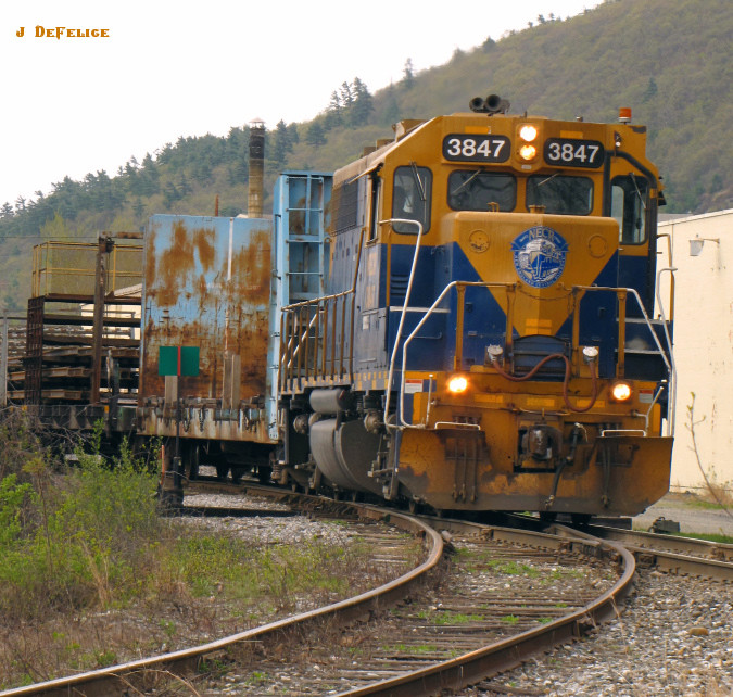 Photo of NECR at Brattleboro VT with rail train