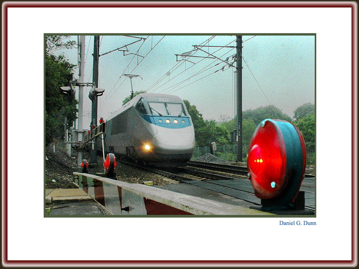 Photo of Acela passing  over Palmer  Street  Pawcatuck, Conn