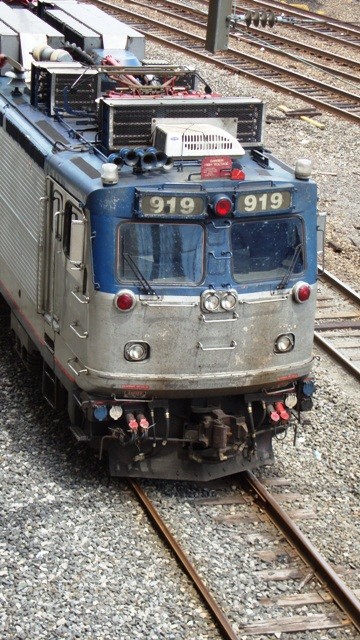 Photo of Amtrak AEM-7 919 sitting outside 30th Street Station Platforms