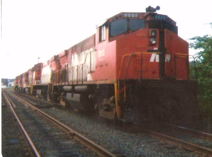 Photo of P&W M420 #2003 leading 4 units and a cab