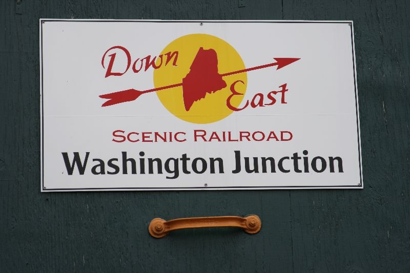 Photo of A new DownScenic RR Sign freshly painted and attached.