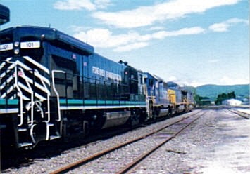 Photo of two ex conrail b23-7's on there to a new home and a new railroad