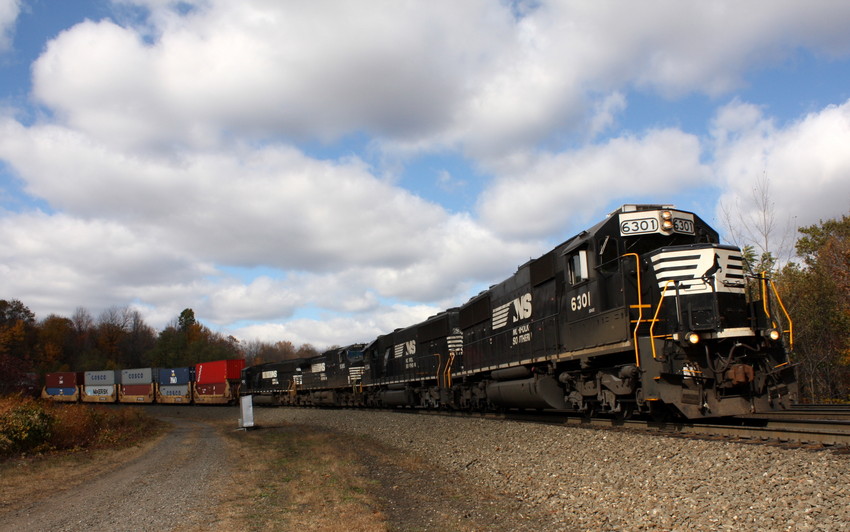 Photo of Eastbound containers with head end helpers added passes Bennington Curve
