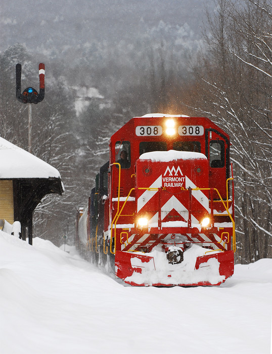 Photo of VRS Salt Extra passes the Ludlow Depot in Falling Snow