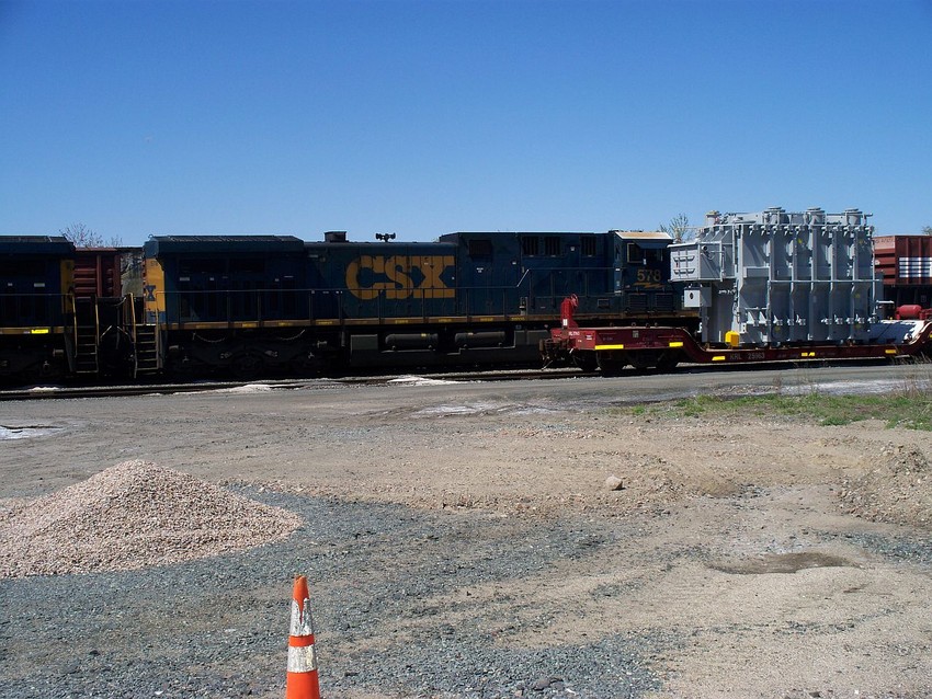 Photo of A partly obscured CSX CW44AC in Framingham.