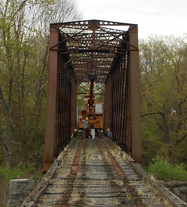 Photo of Dropping Bridge Timbers into Bay 12, Bridge C9