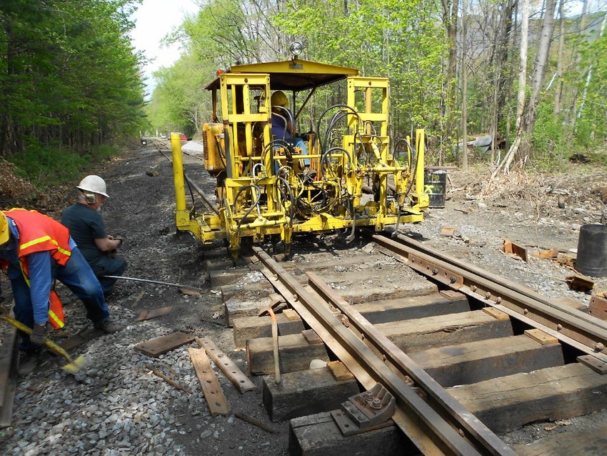 Photo of Tamping the new switch at 24.75