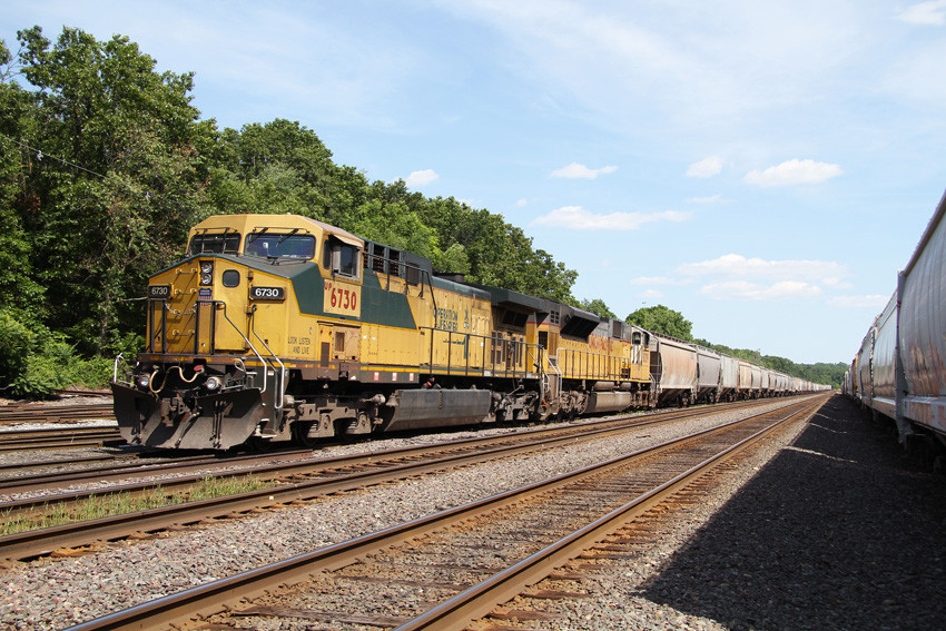 Photo of UP #6730 with empty grain train at Fitchburg, MA