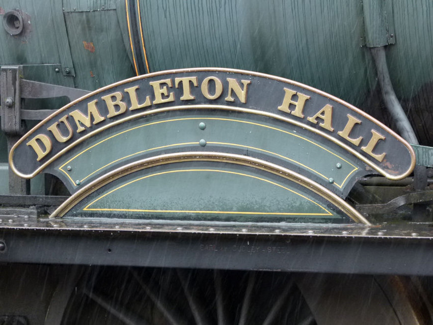 Photo of The nameplate of Dumbleton Hall