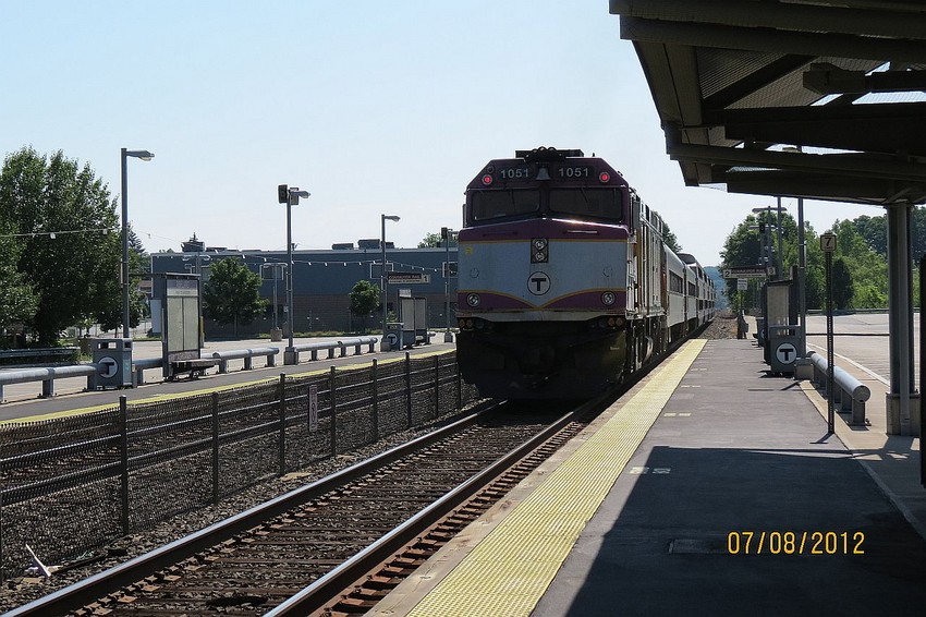Photo of MBTA F40PH-2C 1051 heads to Boston.