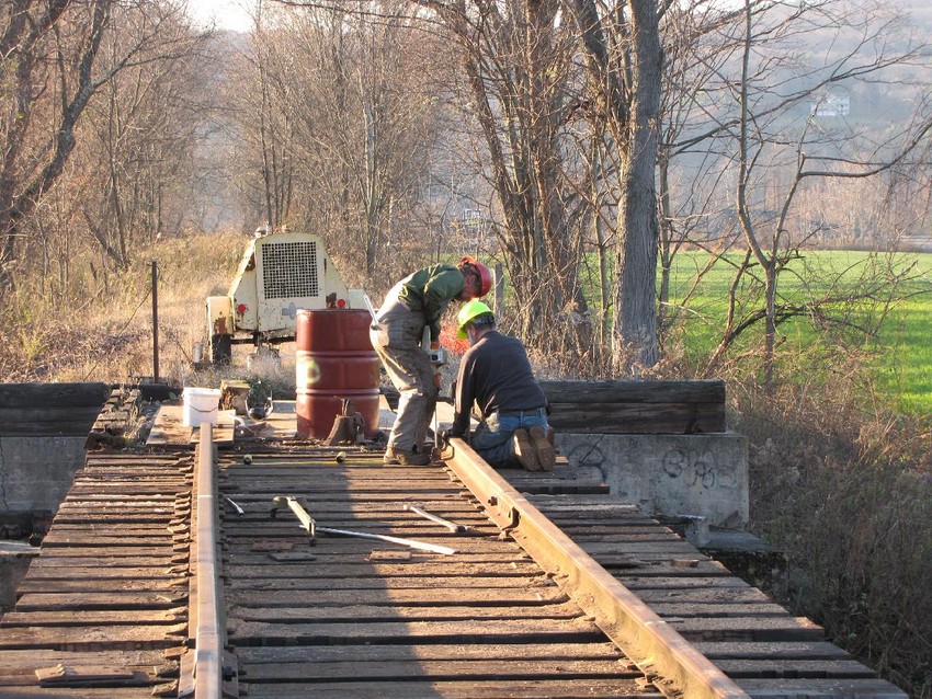 Photo of C9 Crew Installing another rail.