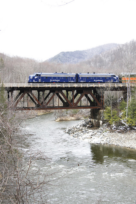 Photo of PAR1 and PAR2 cross the bridge on the approach to the Hoosac Tunnel